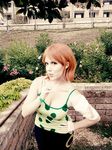  1girl bandage breasts camisole cosplay hot large_breasts nami nami_(cosplay) nami_(one_piece) nami_(one_piece)_(cosplay) one_piece orange_hair photo solo 