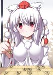  animal_ears board_game breasts close-up detached_sleeves hat highres holding inubashiri_momiji looking_at_viewer medium_breasts nori_tamago pom_pom_(clothes) pov red_eyes short_hair shougi solo tokin_hat touhou white_hair wolf_ears 