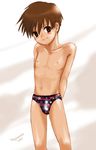  bad_id bad_pixiv_id brown_eyes brown_hair konami logo male_focus male_swimwear original solo swim_briefs swimwear torajimaneko 