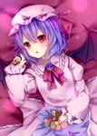  amashiro_natsuki bad_id bad_pixiv_id bat_wings bed_sheet blue_hair cookie food hat holding looking_at_viewer lying mob_cap open_mouth red_eyes remilia_scarlet short_hair solo touhou wings 