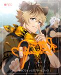 3boys animal_ears bandana bandana_around_neck black_gloves blonde_hair blue_eyes brown_hair brown_shirt carrying carrying_over_shoulder carrying_person character_name commentary_request con_potata fingerless_gloves gloves holding holding_marker hyena_boy hyena_ears index_finger_raised jack_howl leona_kingscholar looking_at_viewer male_focus marker multicolored_hair multiple_boys outdoors recording ruggie_bucchi savanaclaw_dorm_uniform shirt short_hair single_glove translation_request twisted_wonderland upper_body viewfinder wolf_boy wolf_ears writing yellow_bandana 