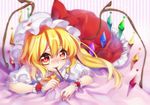  :d ascot bed_sheet blonde_hair blush flandre_scarlet food hat kyouda_suzuka looking_at_viewer lying mob_cap mouth_hold on_stomach open_mouth orange_eyes pocky side_ponytail smile solo touhou wings wrist_cuffs 