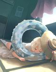  blonde_hair closed_eyes hat innertube lowres lying original sleeping solo weno weno's_blonde_original_character 