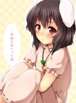  animal_ears blush brown_hair bunny_ears carrot carrot_necklace dress inaba_tewi jewelry nnyara pendant pink_dress pout red_eyes short_hair smile solo touhou translated 