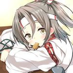  absurdres artist_name blush brown_hair food head_rest headband highres japanese_clothes kantai_collection looking_at_viewer mouth_hold muneate ryuki_(ryukisukune) signature solo yellow_eyes zuihou_(kantai_collection) 