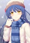  bangs blue_hair blush brown_eyes coat hand_on_own_shoulder hat highres inanaki_shiki long_hair long_sleeves looking_at_viewer love_live! love_live!_school_idol_project scarf smile snow snowing solo sonoda_umi striped striped_scarf upper_body yellow_eyes 
