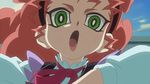  1girl animated animated_gif ass big_hair bow dress green_eyes hair_bow hochun_mieru jewelry long_hair orange_hair pendant solo yu-gi-oh! yuu-gi-ou_arc-v 