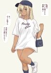  1girl absurdres bag black_headwear black_socks blonde_hair blue_eyes blush bracelet daipunch dark_skin earrings gyaru handbag highres jewelry looking_at_viewer no_pants original pink_nails shirt shirt_hold short_sleeves socks speech_bubble standing t-shirt tan translation_request white_footwear white_shirt 