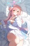  1girl angel_wings bed_sheet blue_archive blush breasts chie_(user_snfh8333) cleavage crescent crescent_pin feathered_wings flower hair_bun hair_flower hair_ornament halo highres large_breasts long_hair long_sleeves looking_at_viewer mika_(blue_archive) open_mouth pillow pink_hair pink_halo purple_flower shirt single_side_bun solo white_shirt white_wings wings yellow_eyes 
