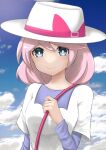  1girl blue_eyes blue_sky closed_mouth cloud cloudy_sky commentary_request hair_between_eyes hat long_sleeves looking_at_viewer medium_hair mole mole_under_eye pink_hair pokemon pokemon_bw2 shirt sky smile solo white_hat white_shirt yancy_(pokemon) yuuki510510 