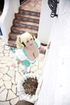  1girl asian blonde_hair breasts brown_eyes chouzuki_maryou cleavage cosplay dirndl garden german_clothes headphones jewelry large_breasts necklace nitroplus photo plump short_hair solo star super_pochaco super_pochaco_(cosplay) thighhighs 
