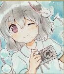  1girl black_ribbon blue_background blush brown_hair closed_mouth collared_shirt commentary highres looking_at_viewer medium_hair neck_ribbon one_eye_closed pink_eyes pom_pom_(clothes) puffy_short_sleeves puffy_sleeves rapameri ribbon shameimaru_aya shikishi shirt short_sleeves smile solo touhou traditional_media white_shirt 