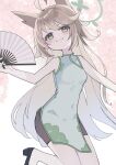  1girl :3 absurdres alternate_costume alternate_hairstyle animal_ears bike_shorts black_shoes blue_archive brown_hair china_dress chinese_clothes dress folding_fan fox_ears fox_girl green_eyes green_halo halo hand_fan highres inaba_reito long_hair otogi_(blue_archive) patterned_background shoes smile solo 