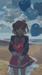  1girl 62_retas absurdres aijou_karen backlighting balloon beach blue_jacket brown_eyes brown_hair closed_mouth cloud cloudy_sky commentary cowboy_shot crown epaulettes hashtag-only_commentary heart_balloon highres holding holding_balloon hugging_object jacket light_smile long_sleeves looking_at_viewer mini_crown miniskirt multicolored_jacket outdoors parted_bangs red_jacket red_skirt shore short_hair shoujo_kageki_revue_starlight single_horizontal_stripe skirt sky sleeve_cuffs solo standing straight-on striped_clothes striped_skirt tilted_headwear two_side_up waist_cape yellow_trim 