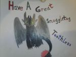 ambiguous_gender black_skin claws dragon feral green_eyes how_to_train_your_dragon looking_at_viewer night_fury photo scales solo text toothless unknown_artist wings 