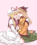  2girls absurdres black_hat blonde_hair blush commentary_request constellation_print detached_sleeves dress facing_another frilled_dress frilled_sleeves frills green_skirt hand_grab hat hat_ribbon highres long_hair long_sleeves looking_at_another matara_okina mob_cap mochigumo multiple_girls open_mouth orange_sleeves orange_tabard pink_background purple_tabard red_ribbon ribbon simple_background skirt sweat tabard touhou white_dress wide_sleeves yakumo_yukari yellow_eyes yuri 