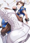  1girl boots bracelet breasts brown_eyes brown_hair bun_cover china_dress chinese_clothes chun-li commentary_request double_bun dress earrings hair_bun highres jewelry kicking looking_at_viewer medium_breasts pantyhose pelvic_curtain short_hair solo spiked_bracelet spikes street_fighter street_fighter_ii_(series) thighs white_boots yagi2013 