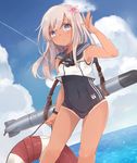  blonde_hair blue_eyes flower hair_ornament innertube kantai_collection long_hair riruno ro-500_(kantai_collection) school_swimsuit solo swimsuit swimsuit_under_clothes tan torpedo 