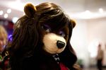  bear cherry_(character) eyelashes eyeshadow female fursuit hair kiwikig long_hair looking_at_viewer makeup mammal photo real 