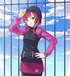  adjusting_clothes adjusting_hat beanie cloud commentary cowboy_shot day hand_on_hip hat highres jacket long_sleeves looking_at_viewer love_live! love_live!_school_idol_project nishikino_maki open_mouth outdoors pants purple_eyes red_hair short_hair sky sleeveless smile solo standing star sweater wawawa_(hisuterisisusa) 
