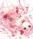 blue_eyes breasts candy cleavage dress food garter_straps highres ia_(vocaloid) ikari_(aor3507) lollipop long_hair lying macaron on_back pink_hair small_breasts solo thighhighs vocaloid wrapped_candy 