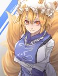  1girl blonde_hair breast_hold breasts dated female fox_tail hat highres large_breasts looking_at_viewer multiple_tails orange_eyes reiga_(act000) short_hair solo tail touhou yakumo_ran 