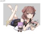  1girl animal_ears arm_support artist_name bare_shoulders barefoot black_shirt blue_shorts border closed_mouth clothing_request collar dog_ears dot_nose full_body fumo_(doll) grey_background holding holding_magazine hololive inugami_korone inugami_korone_(roomwear) listener_(inugami_korone) looking_at_viewer low_ponytail lying magazine_(object) medium_hair nekomata_okayu on_stomach pillow ponytail red_eyes riryn77 shirt short_shorts shorts simple_background solo twitter_username virtual_youtuber white_border 