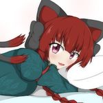  animal_ears braid cat_day cat_tail commentary_request fang kaenbyou_rin long_hair looking_at_viewer lying multiple_tails on_stomach open_mouth pillow red_eyes red_hair seo_haruto solo tail touhou twin_braids 