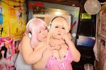  2girls asian breasts cosplay fat headphones huge_breasts luu_(cosplayer) multiple_girls nitroplus photo pink_hair replica_doll super_sonico super_sonico_(cosplay) 