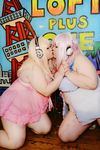  2girls asian breasts cosplay fat headphones huge_breasts luu_(cosplayer) multiple_girls nitroplus photo pink_hair replica_doll super_sonico super_sonico_(cosplay) 