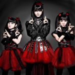  3girls \m/ \v/ asian babymetal bangs belt black_hair black_shirt double_\m/ dress fox_shadow_puppet j-rock japanese kikuchi_moa long_sleeves mizuno_yui multiple_girls musician nakamoto_suzuka photo pteruges realistic red_skirt shirt sleeveless studded_belt studded_bracelet twintails 