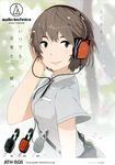  absurdres audio-technica bag between_breasts breasts brown_hair headphones highres original shirt short_hair short_sleeves solo strap_cleavage uki_atsuya 