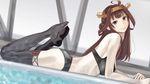  ahoge arched_back bikini black_bikini black_eyes black_legwear brown_hair double_bun dutch_angle hairband headgear highres kantai_collection kongou_(kantai_collection) kurorichin long_hair looking_at_viewer lying on_stomach poolside smile solo swimsuit thighhighs 