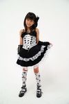  1girl ai_chan asian black_hair gothic_lolita highres junior_idol lolita_fashion photo rose white_background 