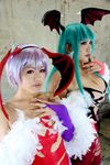  2girls asian breasts capcom chouzuki_maryou cosplay large_breasts lilith_aensland lilith_aensland_(cosplay) morrigan_aensland morrigan_aensland_(cosplay) multiple_girls photo plump suzuka_itsuki vampire_(game) 