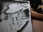  armband art_brush character_name commentary crossed_arms hair_over_one_eye hat inkwell looking_at_viewer monochrome moriya_suwako mouth_hold paintbrush pen photo sidelocks straw_hat touhou tres-iques wheat 