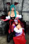  2girls asian breasts capcom chouzuki_maryou cosplay large_breasts lilith_aensland lilith_aensland_(cosplay) morrigan_aensland morrigan_aensland_(cosplay) multiple_girls photo plump suzuka_itsuki vampire_(game) 