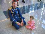  age_difference baby black_hair brown_hair cosplay elicia_hughes elysia_hughes facial_hair father_and_daughter fullmetal_alchemist glasses hughes kneeling maes_hughes male military military_uniform photo stubble uniform 