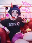  1girl 2024 black_crowser black_shirt blue_hair breasts couch food happy_new_year highres horns medium_breasts midriff original pink_shorts popcorn purple_eyes red_nails ringed_eyes shirt shorts smile solo stomach t-shirt teeth v 