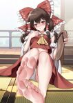  1girl absurdres ascot bare_legs barefoot black_hair blurry blurry_background blush bow breasts brown_footwear closed_mouth day detached_sleeves feet foot_focus frilled_bow frilled_hair_tubes frilled_shirt_collar frills hair_bow hair_tubes hakurei_reimu hand_up highres holding holding_shoes indoors legs long_hair looking_at_viewer midriff_peek oirin panties railing red_bow red_eyes red_skirt red_vest sandals shoes sitting skirt small_breasts soles solo stairs tatami toes touhou underwear unworn_sandals unworn_shoes vest white_panties white_sleeves wide_sleeves yellow_ascot 