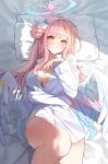  1girl angel_wings bed_sheet blue_archive blush breasts chie_(user_snfh8333) cleavage crescent crescent_pin feathered_wings flower hair_bun hair_flower hair_ornament halo highres large_breasts long_hair long_sleeves looking_at_viewer mika_(blue_archive) open_mouth pillow pink_hair pink_halo purple_flower shirt single_side_bun solo white_shirt white_wings wings yellow_eyes 