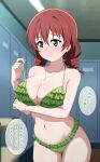  1girl absurdres adjusting_clothes adjusting_swimsuit aqua_eyes arm_under_breasts ass_visible_through_thighs bikini blush breasts brown_hair commentary_request drill_hair embarrassed emma_verde freckles green_bikini highres hoenn_(jgm1102) indoors jewelry large_breasts locker locker_room love_live! love_live!_nijigasaki_high_school_idol_club medium_hair navel necklace solo swimsuit translation_request twin_drills 