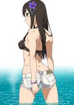  ass back bare_shoulders bikini bikini_top black_bikini black_hair bracelet butt_crack cutoffs flower fringe_trim from_behind hair_flower hair_ornament highres idolmaster idolmaster_cinderella_girls jewelry long_hair profile shibuya_rin shiny shiny_skin short_shorts shorts solo suna swimsuit wading 