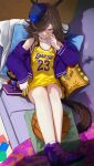  1girl alternate_costume animal_ears bao_(pixiv_99415611) bare_shoulders basketball basketball_jersey brown_hair card commentary_request couch full_body highres horse_ears horse_girl horse_tail jacket jacket_partially_removed legs_up long_hair long_sleeves looking_at_viewer los_angeles_lakers on_couch pillow purple_eyes purple_shoes rice_shower_(umamusume) shoes sneakers solo tail tilted_headwear towel umamusume 
