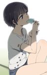  black_hair dripping eating food from_side mattaku_mousuke original paw_print popsicle print_shirt shirt short_hair short_shorts shorts sitting solo t-shirt 