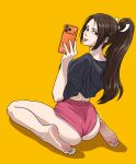  1girl absurdres ass barefoot black_hoodie blush breasts brown_eyes brown_hair cellphone english_commentary feet from_behind high_ponytail highres holding holding_phone hood hoodie large_breasts long_hair looking_at_viewer median_furrow midriff nail_polish orange_background parted_bangs phone ponytail red_shorts selfie shadow shiranui_mai shorts shukeiart signature simple_background sitting smartphone soles solo street_fighter street_fighter_6 the_king_of_fighters thighs toes tongue tongue_out underbutt wariza 