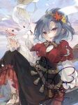  1girl black_skirt blue_hair chinese_zodiac commentary_request embellished_costume fang hair_ornament layered_sleeves leaf leaf_hair_ornament long_sleeves maple_leaf mirror mishaguji open_mouth red_eyes rope sandals shimenawa short_over_long_sleeves short_sleeves signature sitting skin_fang skirt smile snake solo touhou toutenkou watermark white_snake yasaka_kanako year_of_the_snake 