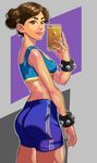  absurdres alternate_hairstyle ass bangs bike_shorts breasts brown_eyes brown_hair cellphone chun-li cowboy_shot double_bun eyebrows from_behind godstime_ojinmah highres iphone lips midriff nose parted_bangs phone self_shot small_breasts smartphone solo sports_bra street_fighter street_fighter_zero_(series) studded_bracelet 