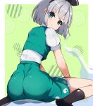  1girl absurdres ass back black_socks blue_eyes blush commentary_request frills from_behind green_background green_skirt green_vest grey_hair hairband highres konpaku_youmu konpaku_youmu_(ghost) looking_at_viewer matcha_yado medium_hair pout shirt short_sleeves sitting skirt socks solo touhou vest wariza white_shirt 
