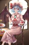  1girl ascot bat_wings chair commentary_request dessert dinotodon dress fang food food_request fork frilled_dress frilled_shirt_collar frilled_sleeves frills hat highres holding holding_food holding_fork holding_plate jewelry light_rays mob_cap open_mouth pink_dress pink_eyes pink_hat plate red_ascot red_sash remilia_scarlet sash short_hair short_sleeves sitting sleeve_garter solo table touhou window wings 